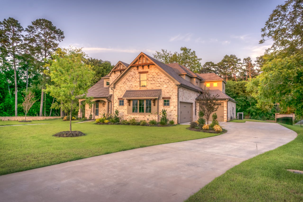 a brick house on a corner lot